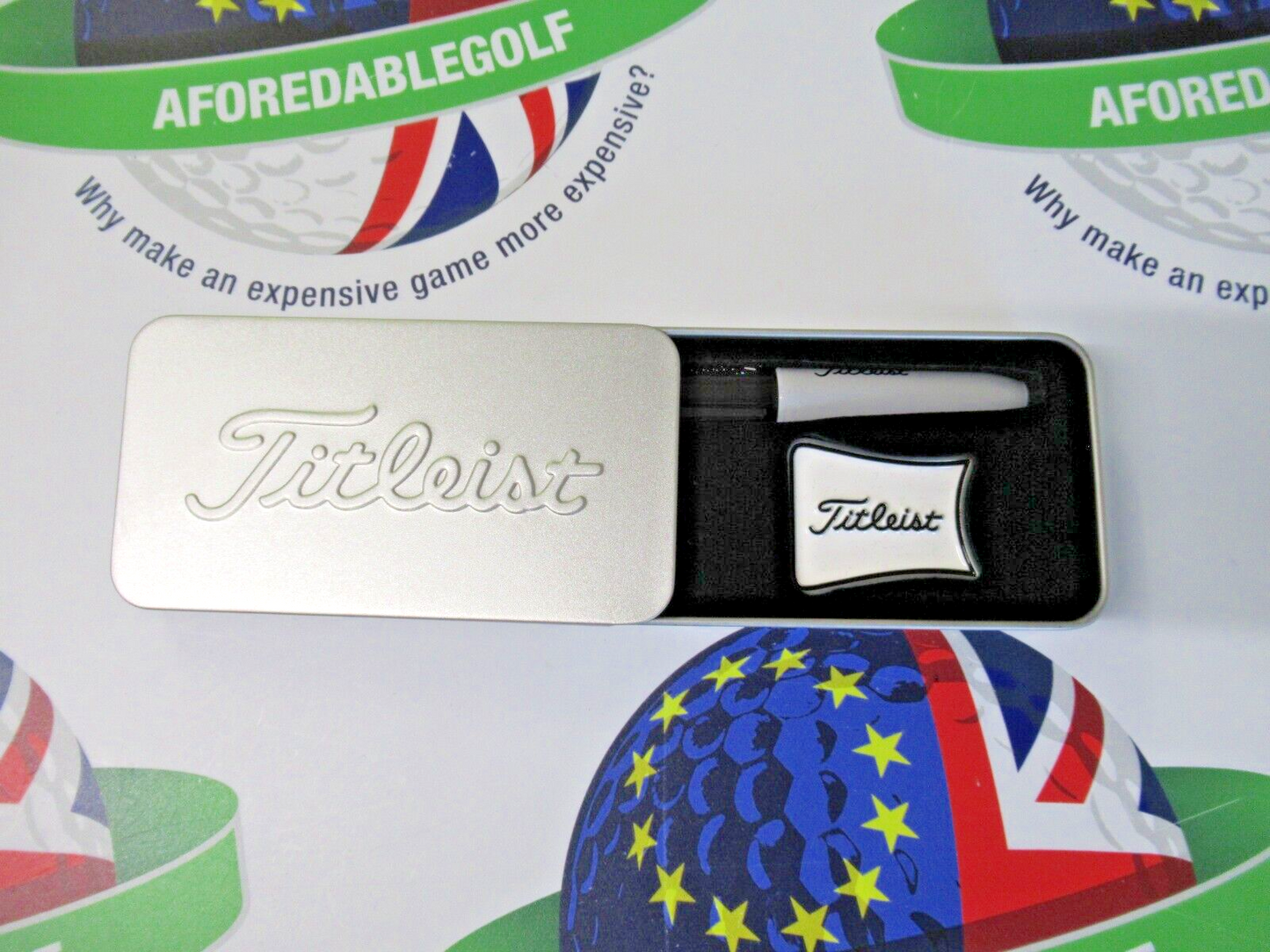 titleist alignment ball marker and black sharpie in presentation tin