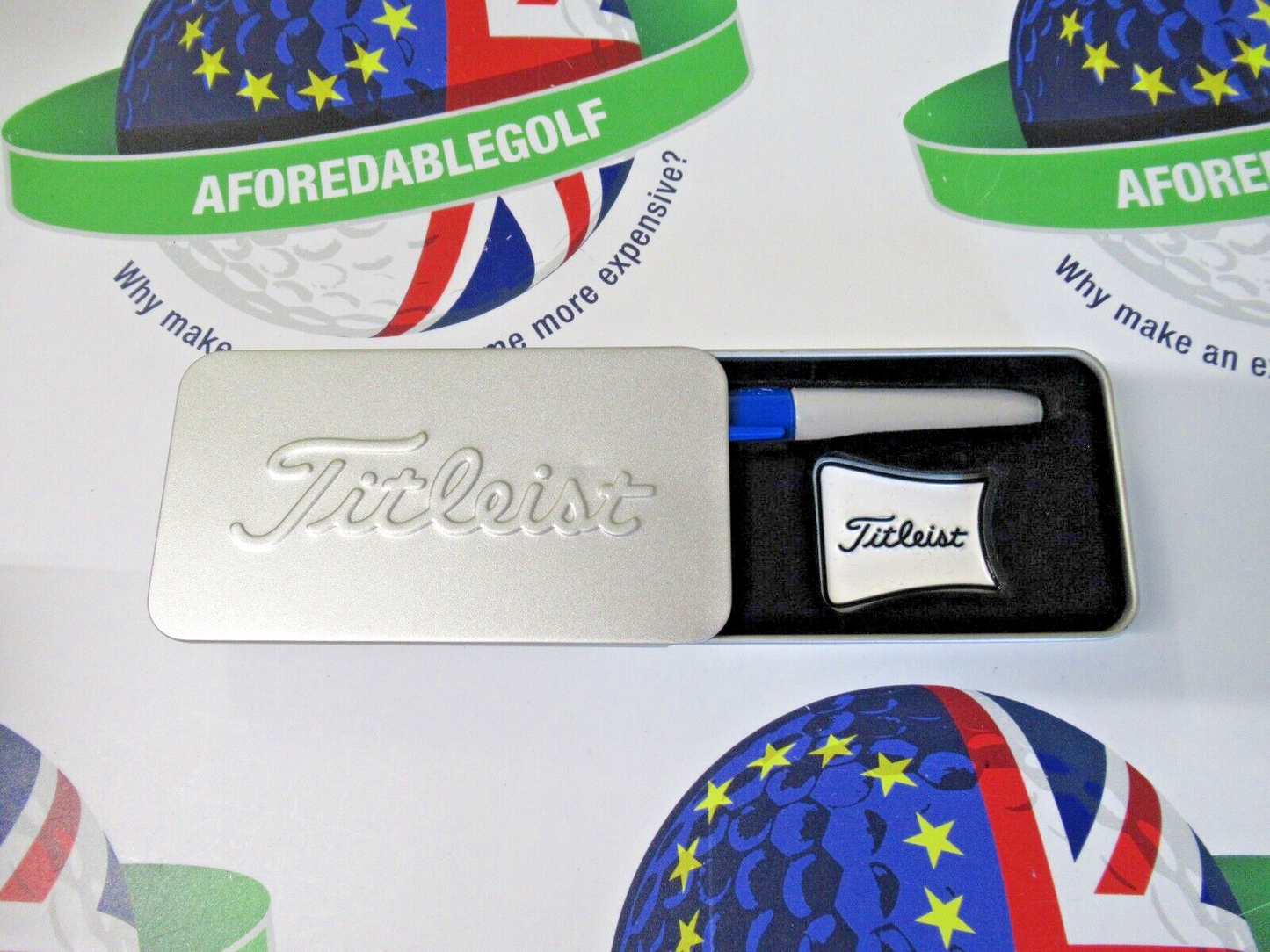 titleist alignment ball marker and blue sharpie in presentation tin