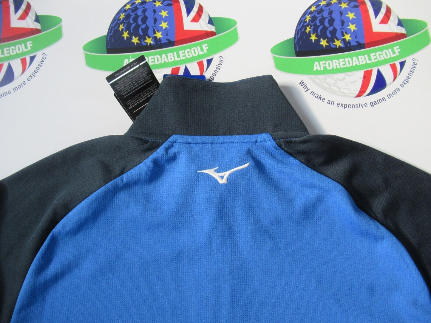 mizuno winter breeze bloc 1/4 zip top blue uk size small